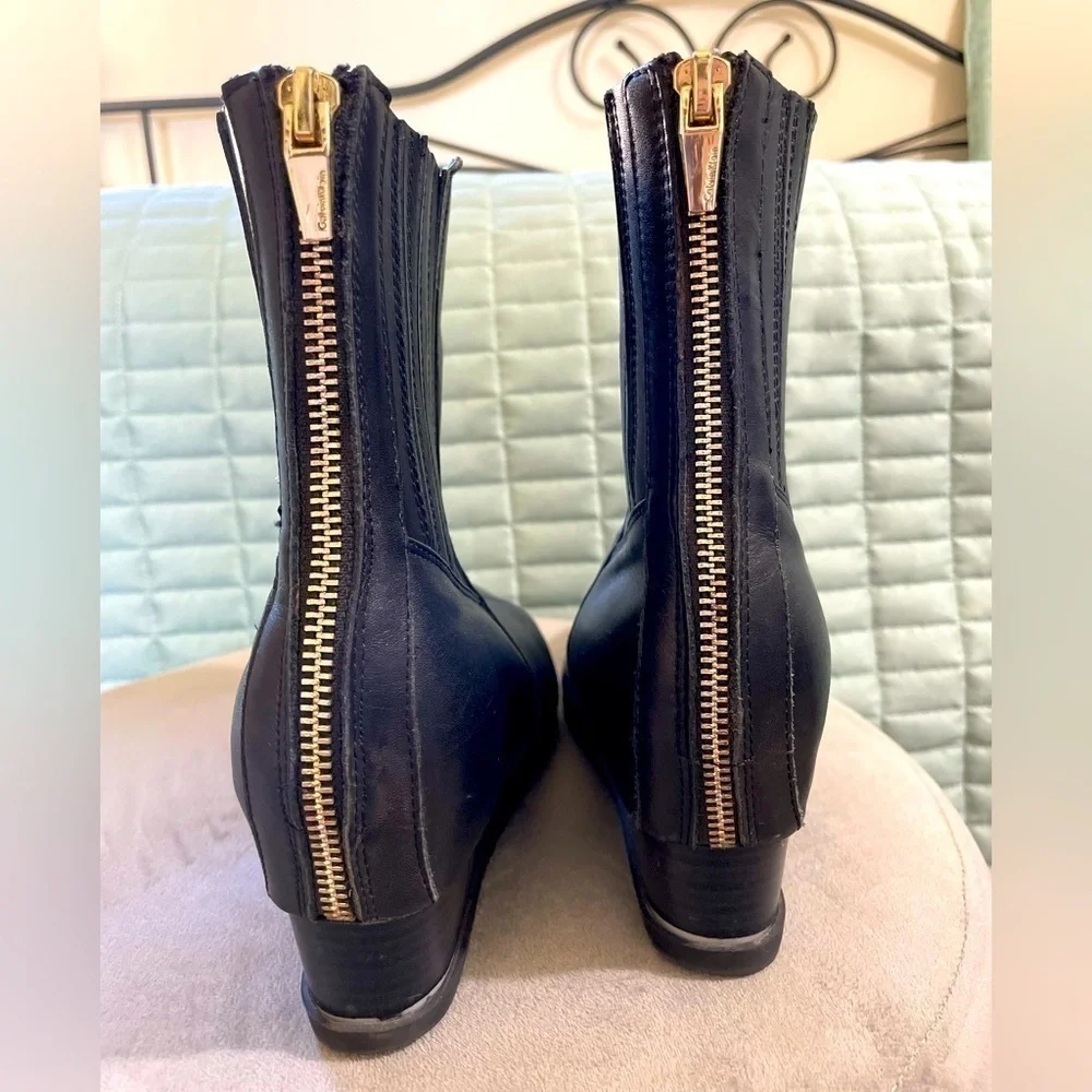 Calvin Klein Judith wedge ankle boots, 100% leather. Super comfortable and cute.